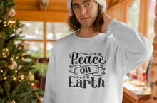 Load image into Gallery viewer, Peace on earth Unisex Premium Sweatshirt