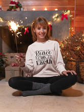 Load image into Gallery viewer, Peace on earth Unisex Premium Sweatshirt
