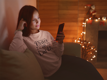 Load image into Gallery viewer, Peace on earth Unisex Premium Sweatshirt

